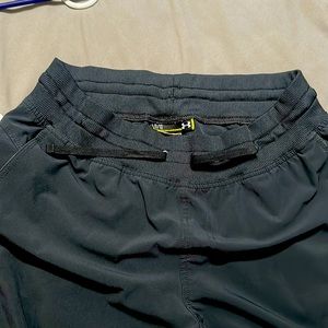 Stretchy dri-fit pants with rouging on the side.